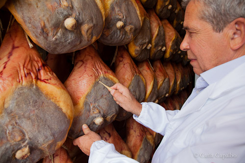 the aging prosciutti are tested frequently, Parma